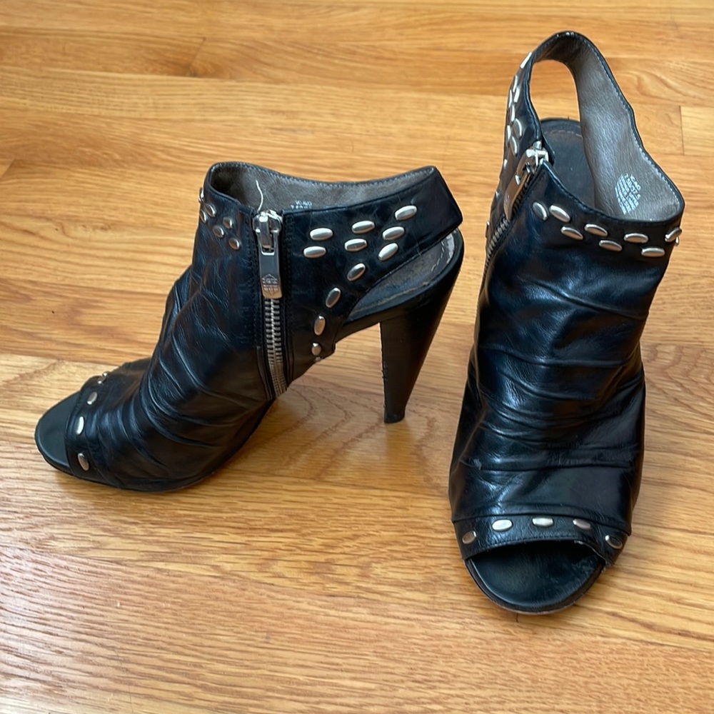 Vince Camuto black leather peekaboo heels with silver metal accents